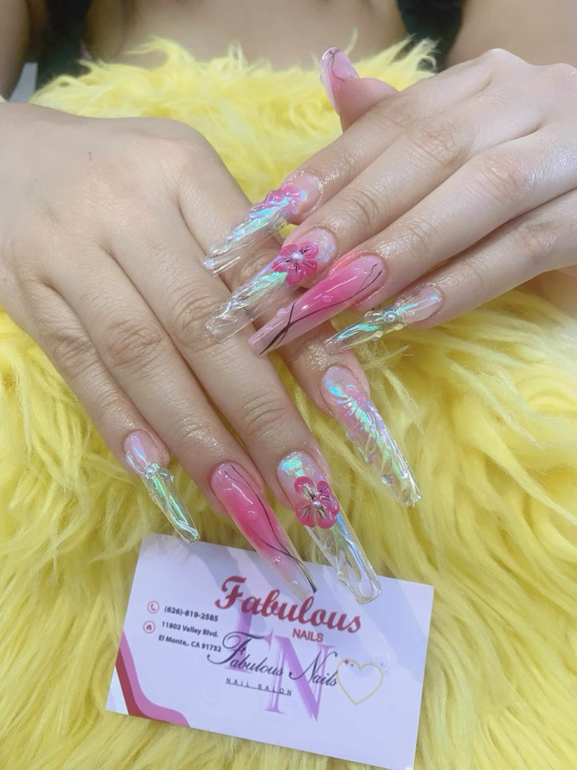 Pink marble nails with iridescent film and a 3D flower on long almond shape