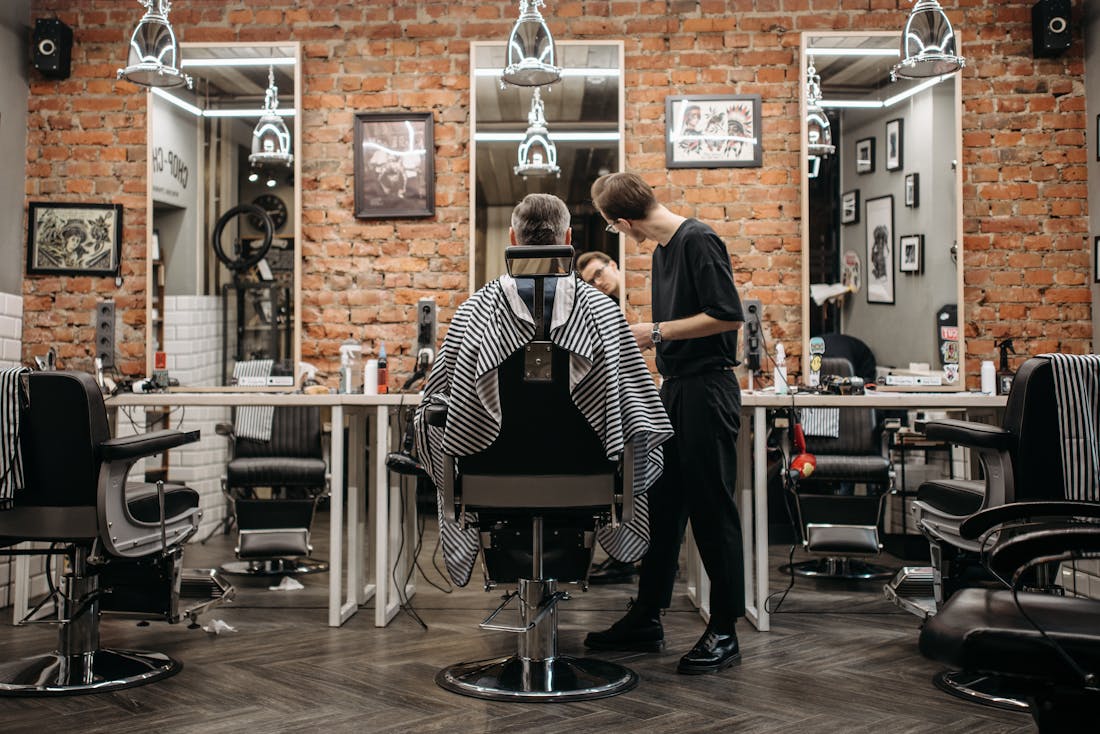 Inside the shop — chairs and framed walls