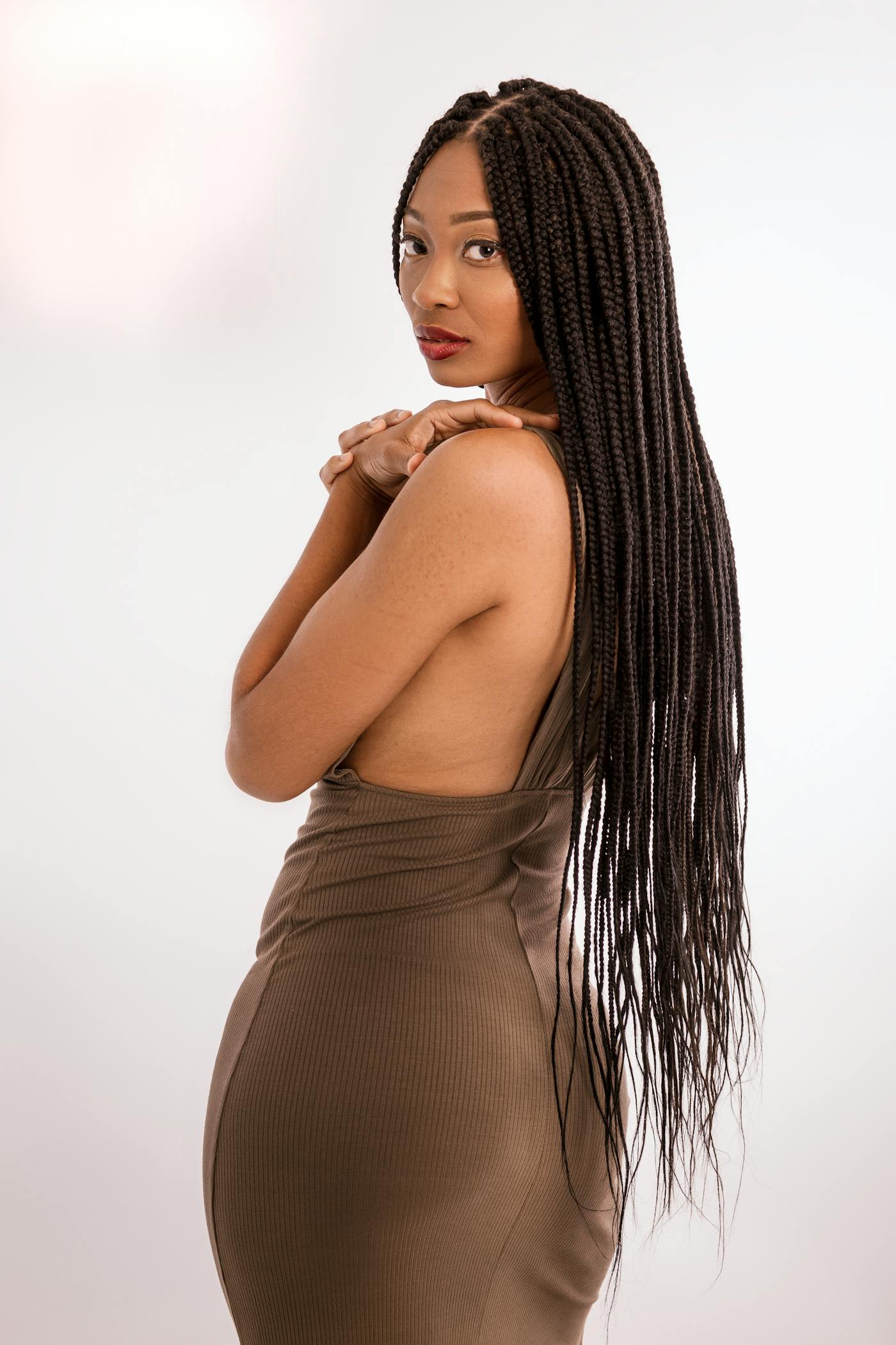 Very long box braids, studio side profile