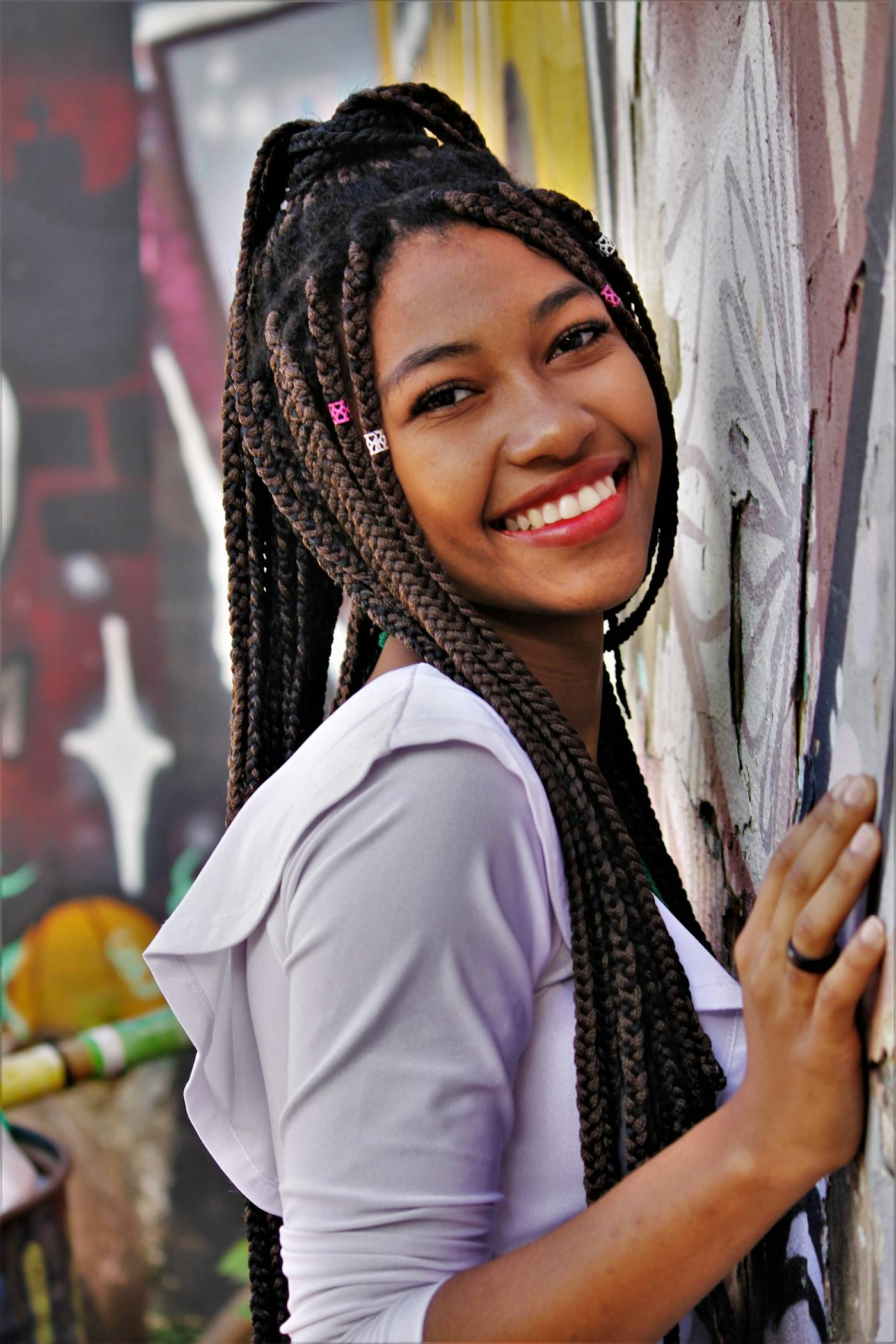 Long box braids accented with hair cuffs