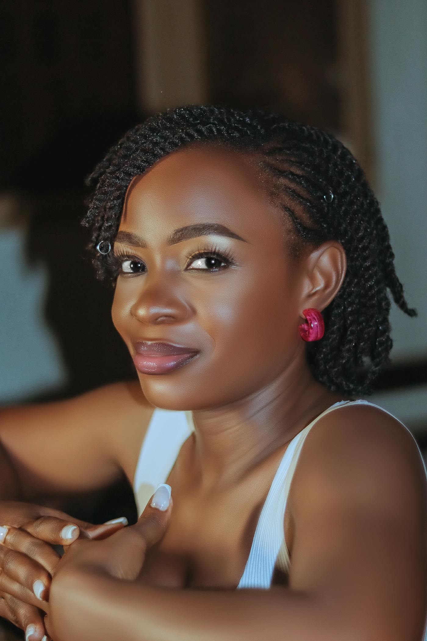 Short natural twists, warm portrait