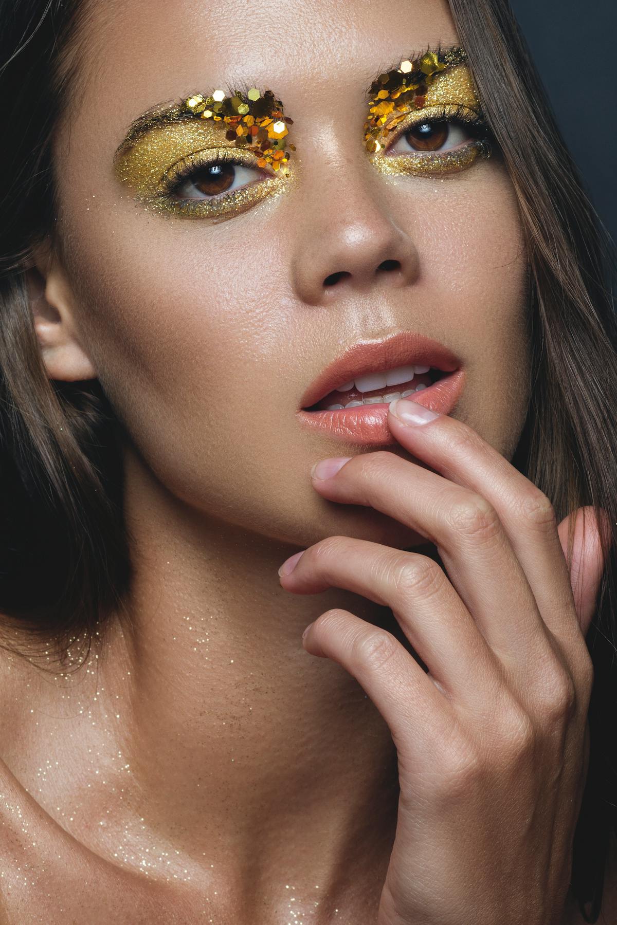 A warm gold editorial eye with luminous skin