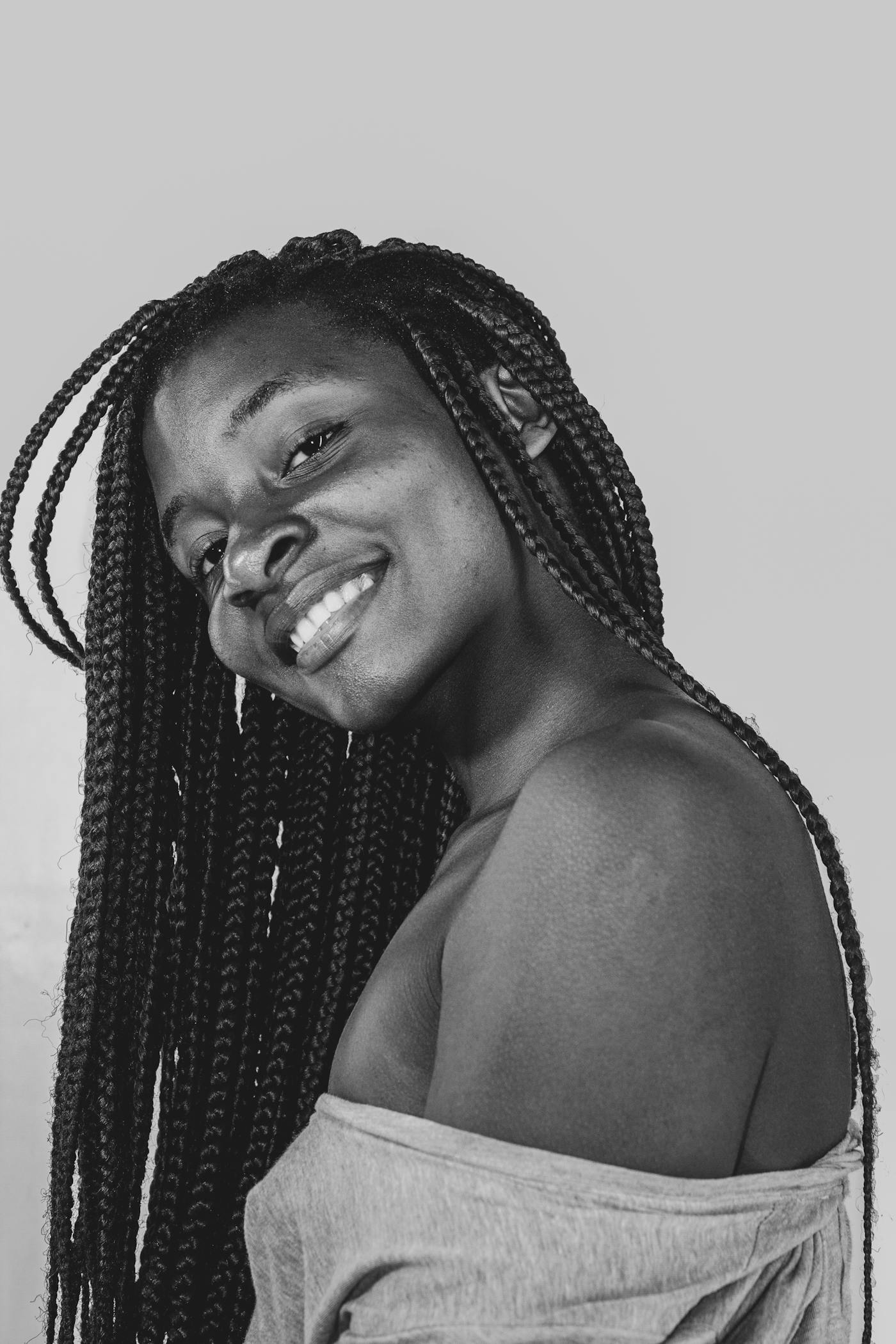 Box braids framing the face