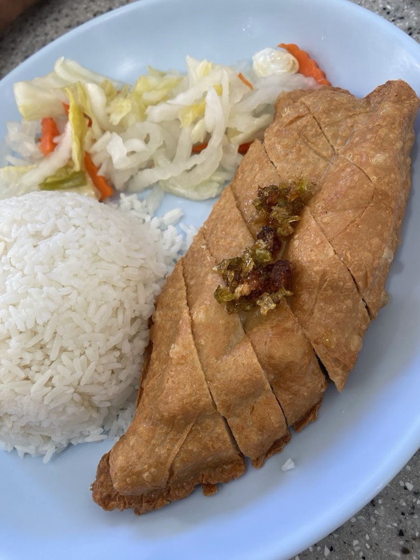 Crispy golden soy cutlet with steamed rice and pickled cabbage
